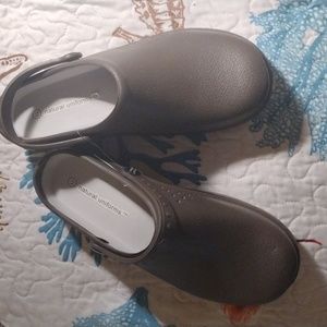 Brown rubber clogs